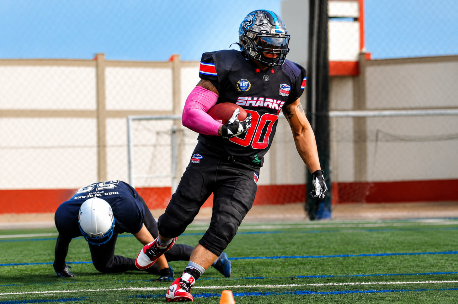 Costa Rica Sharks ball carrier breaking into the open field