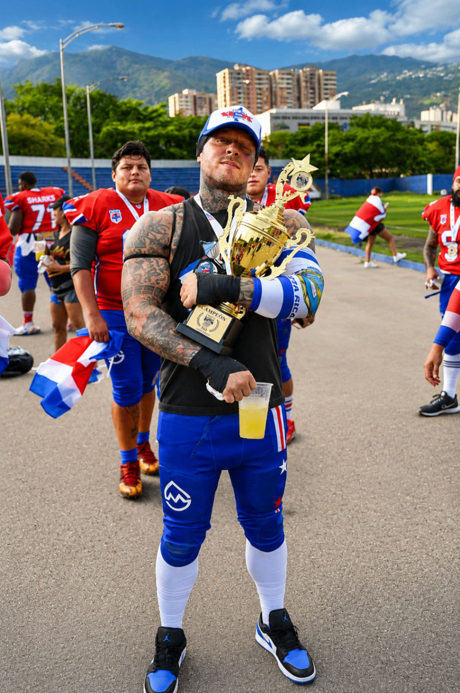 Costa Rica Sharks player holding a championship trophy